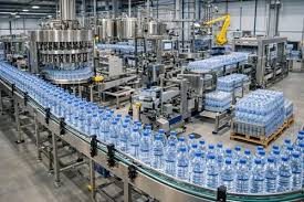industrial bottle conveyor system in mineral water bottling plant
